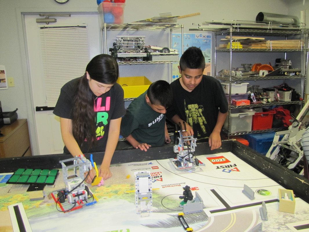 Children in the middle school robotics program